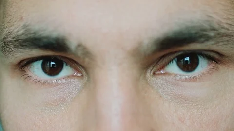Brown eyes men looking at the camera Stock Footage 76940837