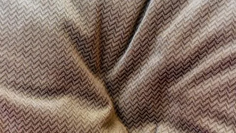 The brown fabric texture as a background Stock Photos