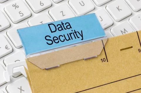 A brown file folder labeled with Data Security A brown file folder labeled... Stock Photos