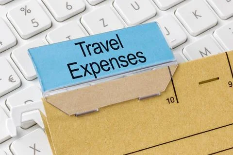 A brown file folder labeled with Travel Expenses Stock Photos