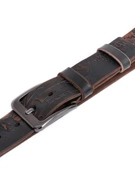 Brown fish pattern leather belt buckle and strap pair Stock Photos