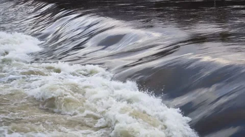 Brown flood water on the River Nith, Dumfries,Scotland Stock Footage 228851118