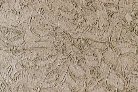 Brown floral embossed batik pattern. Floral pattern. Leaf stamped texture Stock Photos