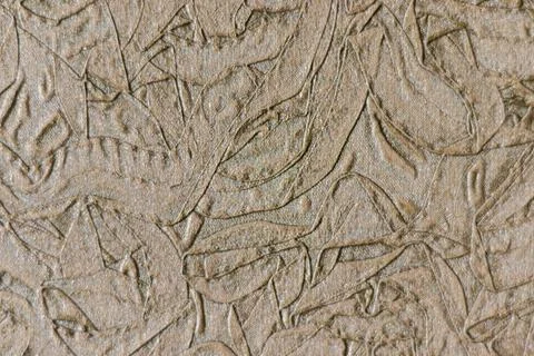 Brown floral embossed batik pattern. Floral pattern. Leaf stamped texture Stock Photos