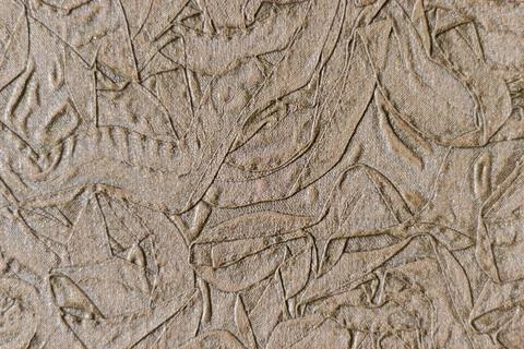 Brown floral embossed batik pattern. Floral pattern. Leaf stamped texture Stock Photos