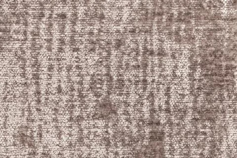 Brown fluffy background of soft, fleecy cloth. Texture of textile closeup Foto stock