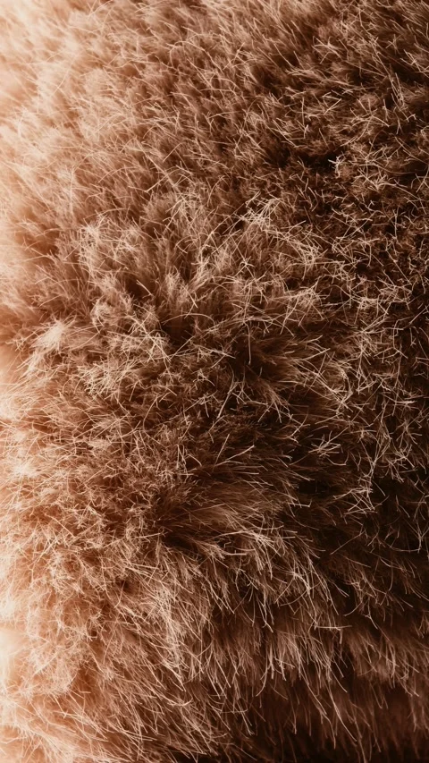 Brown furry texture background close up, soft textile surface and cozy material Stock Footage 335364826