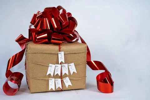 Brown gift box with red bow, "I love you", white background Stock Photos