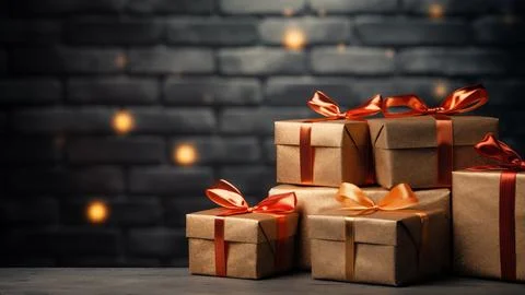 Brown Gift Boxes with Orange Ribbons and Bokeh Stock Photos