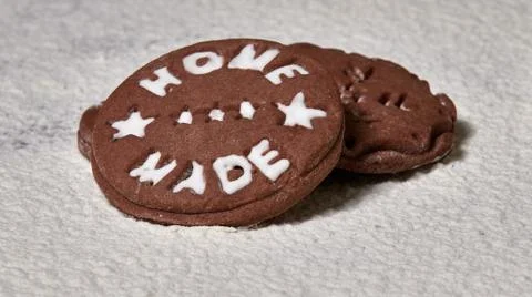 Brown gingerbread. Christmas composition on the table covered with flour. You Stock Photos