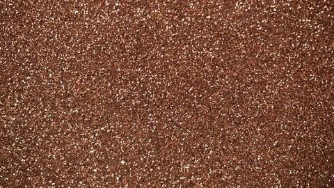 Brown glitter texture background with sparkling particles for creative desi.. Stock Photos