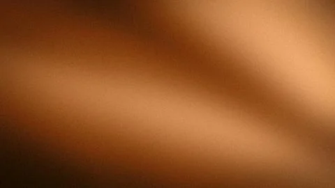 Brown gradient abstract background with warm orange and deep brown shades i.. Stock Photos