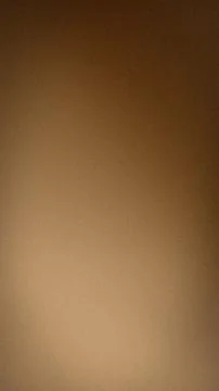 Brown gradient texture background vertical format abstract grainy wallpaper.. Stock Photos