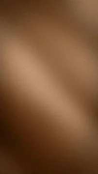 Brown grainy vertical backdrop with warm beige and dark brown gradient abst.. Stock Photos