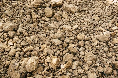 Brown ground soil surface. Texture pattern background. Stock Photos