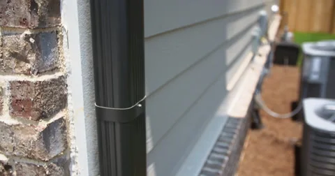 Brown Gutter Close Up Lowering Shot Stock Footage 64817304