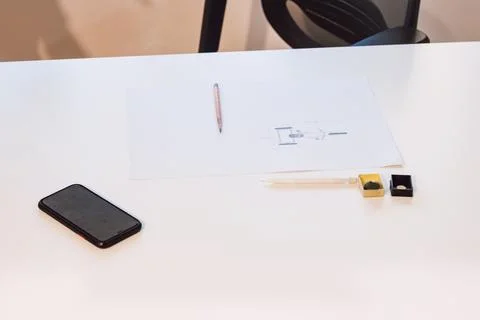 Brown-haired architect is thinking hard about how to create new product desig Stock Photos