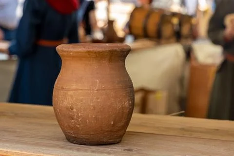 Brown handmade clay pot rustic design base traditional tableware copy space Stock Photos