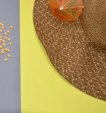 Brown hat on a yellow background. Stock Photos