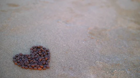 Brown heart made of coffee beans Stock Footage 86334219