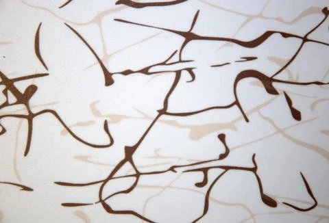 Brown Ink blots on a white background. Texture, background, close-up. Stock Photos