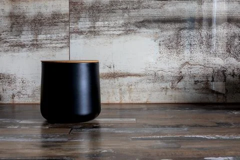 Brown kitchen countertop with a rustic textured wall in the background. Rus.. Stock Photos