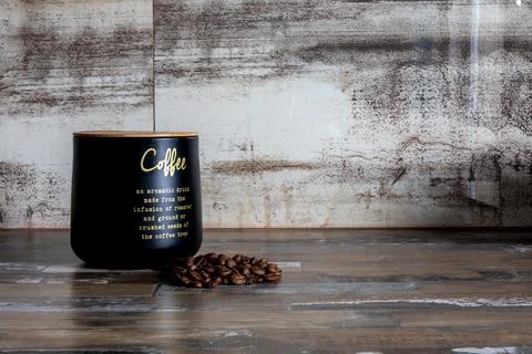 Brown kitchen countertop with a rustic textured wall in the background. Rus.. Stock Photos