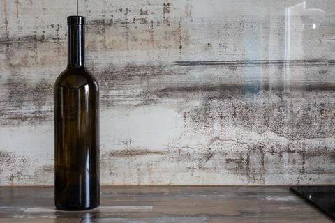 Brown kitchen countertop with a rustic textured wall in the background. Rus.. Stock Photos