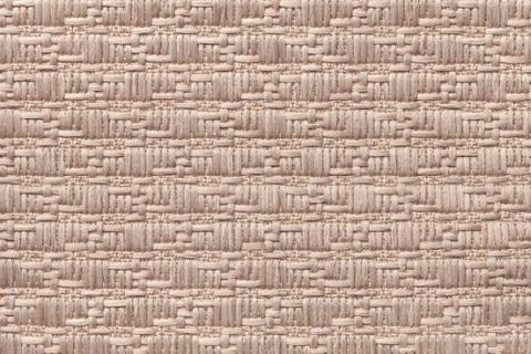 Brown knitted woolen background with a pattern of soft, fleecy cloth. Texture Stock Photos