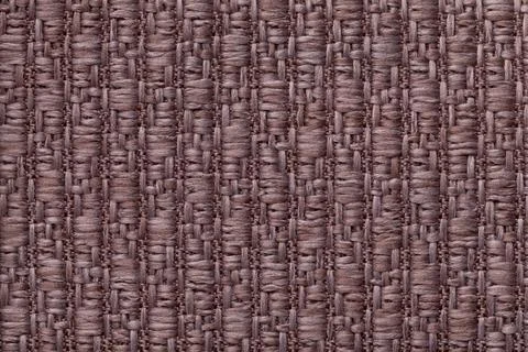 Brown knitted woolen background with pattern of fleecy cloth. Texture of text Foto stock