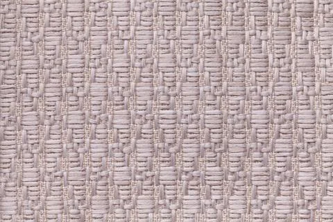 Brown knitted woolen background with a pattern of soft, fleecy cloth. Stock Photos