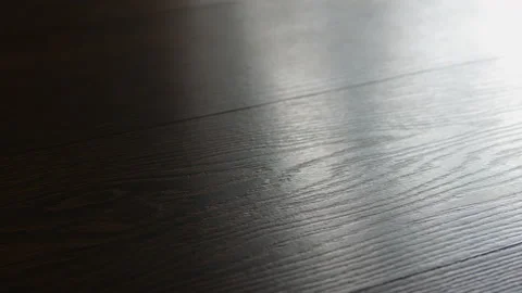 Brown laminate with a camera slide, parquet board. Floor board. Stock Footage 153750360