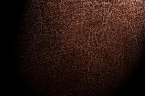 Brown leather background. Texture of genuine leather Stock Photos