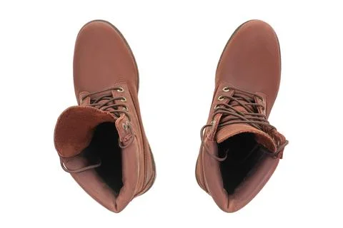 Brown leather boots top view isolated on white background. Stock Photos
