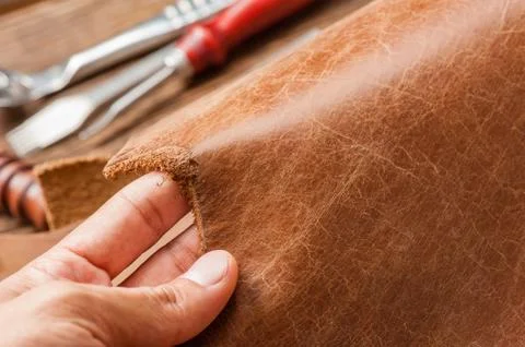 Brown leather for leather working Stock Photos
