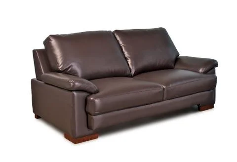 Brown leather sofa Stock Photos