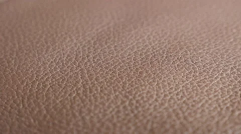 Brown leather sofa surface details 4K 2160p UHD footage - Leather sofa textur Stock Footage 49297972