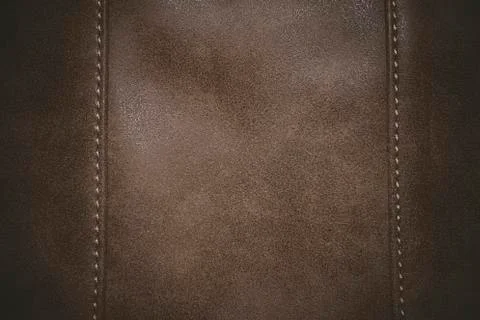 Brown leather texture background surface with seam. Stock Photos