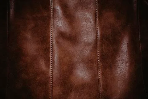 Brown leather texture background surface with seam. Foto stock