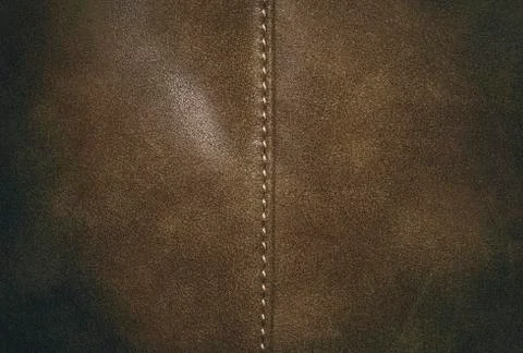 Brown leather texture background surface with seam. Stock-Fotos