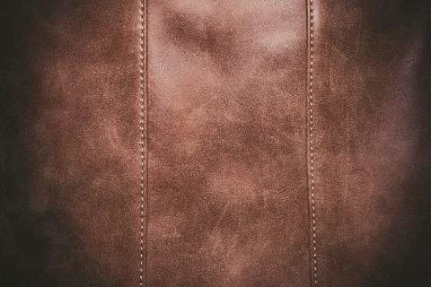Brown leather texture background surface with seam. Stock-Fotos