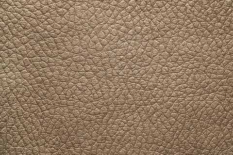 Brown leather texture. Background. Top view closeup. Stock Photos