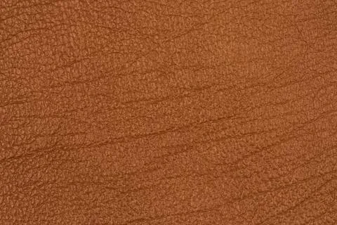 Brown leather texture surface. Close-up of natural grain cow leather brown le 스톡 사진