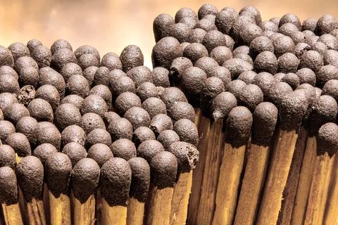 Brown Match Tips in Macro. Close-Up of Brown-Tipped Matches Stock Photos