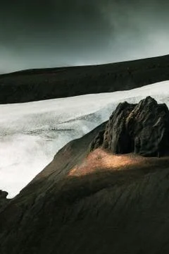 Brown mountain under white clouds during daytime new photo Stock Photos