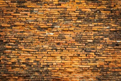 Brown old brick wall texture background Stock Photos