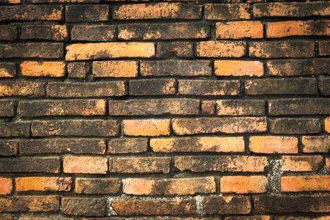 Brown old brick wall texture background Stock Photos