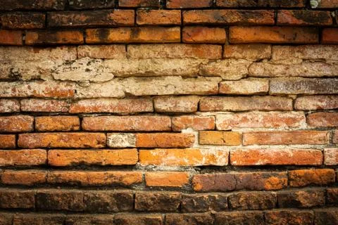 Brown old brick wall texture background Stock Photos