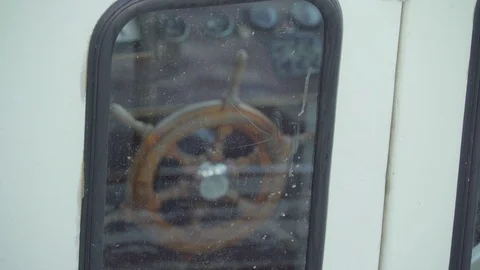 The brown old style steering wheel of the sailboat Stock Footage 93826194