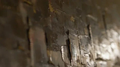 Brown paint on the wall background in 4k slow motion 60fps Stock Footage 153902031
